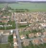 Photos aériennes de "dame" - Photo réf. 174056 - Le coeur du village et son glise paroissiale Sainte-Barbe de 1938, surnomme  La Dame de Fer . C'est la dernire glise d'Europe construite en fer.