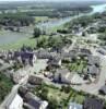 Photos aériennes de "Place" - Photo réf. 17713 - Le vieux bourg avec au centre La Poste et la place de l'abb Thomas. En arrire plan La maine et le pont suspendu.