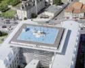 Photos aériennes de "toit" - Photo réf. 1832_24 - L'EC 135 du SAMU sur le toit du centre de neurologie. Cette hlistation en terrasse est une des rares existantes en France.