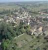 Photos aériennes de "Place" - Photo réf. 21975 - La place du Monument aux Morts, avec la mairie, l'glise du XII.