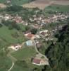 Photos aériennes de "Tour" - Photo réf. 37391 - Au cur du Val d'Arbois, dans un site agrable, le patrimoine du village compte une glise du XIIe sicle remanie au XIXe sicle, un chteau priv du XIXe sicle, et une tour du Gnral Delort.