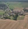 Photos aériennes de "village" - Photo réf. 37432 - A l'ore du Bois Boucot, sur un versant de coteau, le village possde un charme et un attrait indniables o 3 agriculteurs exploitent les terrains.
