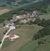 Photos aériennes de "Paysage" - Photo réf. 38324 - En rebord de falaise, dominant le vaste paysage des Rippes d'Arthenas, et au loin toute la Bresse louhannaise, le petit village de Varssia se groupe autour de sa chapelle du XIIe et XVe sicle.