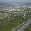 Photos aériennes de "autoroute" - Photo réf. N009457 - Le long de l'autoroute A13, la silhouette du chteau Robert-le-Diable  l'arrire, la Seine et l'activit industrielle aux abords de Rouen.