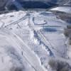 Photos aériennes de "hiver" - Photo réf. N020541 - Vue sur les pistes de le station de sport d'hiver de La Bresse dans les Vosges.