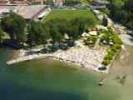 Photos aériennes de "como" - Photo réf. T099220 - Fr : Une plage au bord du lac de Cme. It : Una balneare in bordo del lago di Como.
