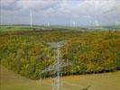Photos aériennes de "pylone" - Photo réf. T082969 - Un pylone de la ligne trs haute tension entre Vigy et Marlenheim et des oliennes en Moselle.