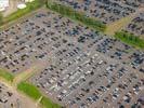 Photos aériennes de Creutzwald (57150) - La Zone Industrielle Lourde | Moselle, Lorraine, France - Photo réf. T100677 - Un parking automobile rempli de voitures neuves.