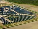 Photos aériennes de "Solaire" - Photo réf. U112205 - Le chantier d'installation de la plus puissante centrale photovoltaique du monde sur l'ancienne base arienne 136 de Toul-Rosires par EDF Energies Nouvelles au 1er Aot 2011.
