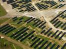 Photos aériennes de "2011" - Photo réf. U112210 - Le chantier d'installation de la plus puissante centrale photovoltaique du monde sur l'ancienne base arienne 136 de Toul-Rosires par EDF Energies Nouvelles au 1er Aot 2011.