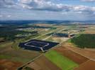 Photos aériennes de "photovoltaique" - Photo réf. U113123 - Le chantier d'installation de la plus puissante centrale photovoltaique du monde sur l'ancienne base arienne 136 de Toul-Rosires par EDF Energies Nouvelles au 29 Aot 2011.