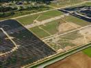 Photos aériennes de "2011" - Photo réf. U113125 - Le chantier d'installation de la plus puissante centrale photovoltaique du monde sur l'ancienne base arienne 136 de Toul-Rosires par EDF Energies Nouvelles au 29 Aot 2011.