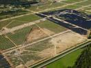 Photos aériennes de "2011" - Photo réf. U113126 - Le chantier d'installation de la plus puissante centrale photovoltaique du monde sur l'ancienne base arienne 136 de Toul-Rosires par EDF Energies Nouvelles au 29 Aot 2011.