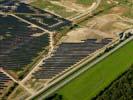 Photos aériennes de "Solaire" - Photo réf. U113129 - Le chantier d'installation de la plus puissante centrale photovoltaique du monde sur l'ancienne base arienne 136 de Toul-Rosires par EDF Energies Nouvelles au 29 Aot 2011.