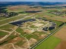 Photos aériennes de "Solaire" - Photo réf. U113133 - Le chantier d'installation de la plus puissante centrale photovoltaique du monde sur l'ancienne base arienne 136 de Toul-Rosires par EDF Energies Nouvelles au 29 Aot 2011.