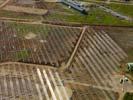 Photos aériennes de "Solaire" - Photo réf. U113138 - Le chantier d'installation de la plus puissante centrale photovoltaique du monde sur l'ancienne base arienne 136 de Toul-Rosires par EDF Energies Nouvelles au 29 Aot 2011.