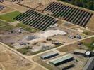 Photos aériennes de "2011" - Photo réf. U115341 - Le chantier d'installation de la plus puissante centrale photovoltaique du monde sur l'ancienne base arienne 136 de Toul-Rosires par EDF Energies Nouvelles au 15 Septembre 2011.