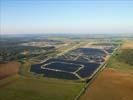 Photos aériennes de "photovoltaique" - Photo réf. U115343 - Le chantier d'installation de la plus puissante centrale photovoltaique du monde sur l'ancienne base arienne 136 de Toul-Rosires par EDF Energies Nouvelles au 28 Septembre 2011.