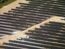 Photos aériennes de "plus" - Photo réf. U115344 - Le chantier d'installation de la plus puissante centrale photovoltaique du monde sur l'ancienne base arienne 136 de Toul-Rosires par EDF Energies Nouvelles au 28 Septembre 2011.