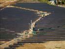 Photos aériennes de "plus" - Photo réf. U115347 - Le chantier d'installation de la plus puissante centrale photovoltaique du monde sur l'ancienne base arienne 136 de Toul-Rosires par EDF Energies Nouvelles au 28 Septembre 2011.