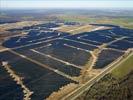Photos aériennes de "Solaire" - Photo réf. U115356 - Le chantier d'installation de la plus puissante centrale photovoltaique du monde sur l'ancienne base arienne 136 de Toul-Rosires par EDF Energies Nouvelles au 16 Janvier 2012.