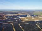 Photos aériennes de "Solaire" - Photo réf. U115357 - Le chantier d'installation de la plus puissante centrale photovoltaique du monde sur l'ancienne base arienne 136 de Toul-Rosires par EDF Energies Nouvelles au 16 Janvier 2012.