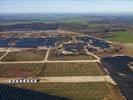 Photos aériennes de "plus" - Photo réf. U115359 - Le chantier d'installation de la plus puissante centrale photovoltaique du monde sur l'ancienne base arienne 136 de Toul-Rosires par EDF Energies Nouvelles au 16 Janvier 2012.