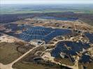 Photos aériennes de "plus" - Photo réf. U115361 - Le chantier d'installation de la plus puissante centrale photovoltaique du monde sur l'ancienne base arienne 136 de Toul-Rosires par EDF Energies Nouvelles au 16 Janvier 2012.