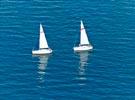 Photos aériennes de "pointe" - Photo réf. E131654 - Deux voiliers sortant en mer au large de la Pointe de Kerhermn