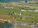 Photos aériennes de "ciel" - Photo réf. E145949 - L'hlicoptre de l'Europe vue du ciel en plein travail de prises de vues ariennes autour des montgolfires du Mondial Air Ballons 2013.