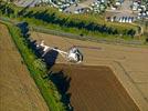 Photos aériennes de "ciel" - Photo réf. E145954 - L'hlicoptre de l'Europe vue du ciel en plein travail de prises de vues ariennes autour des montgolfires du Mondial Air Ballons 2013.